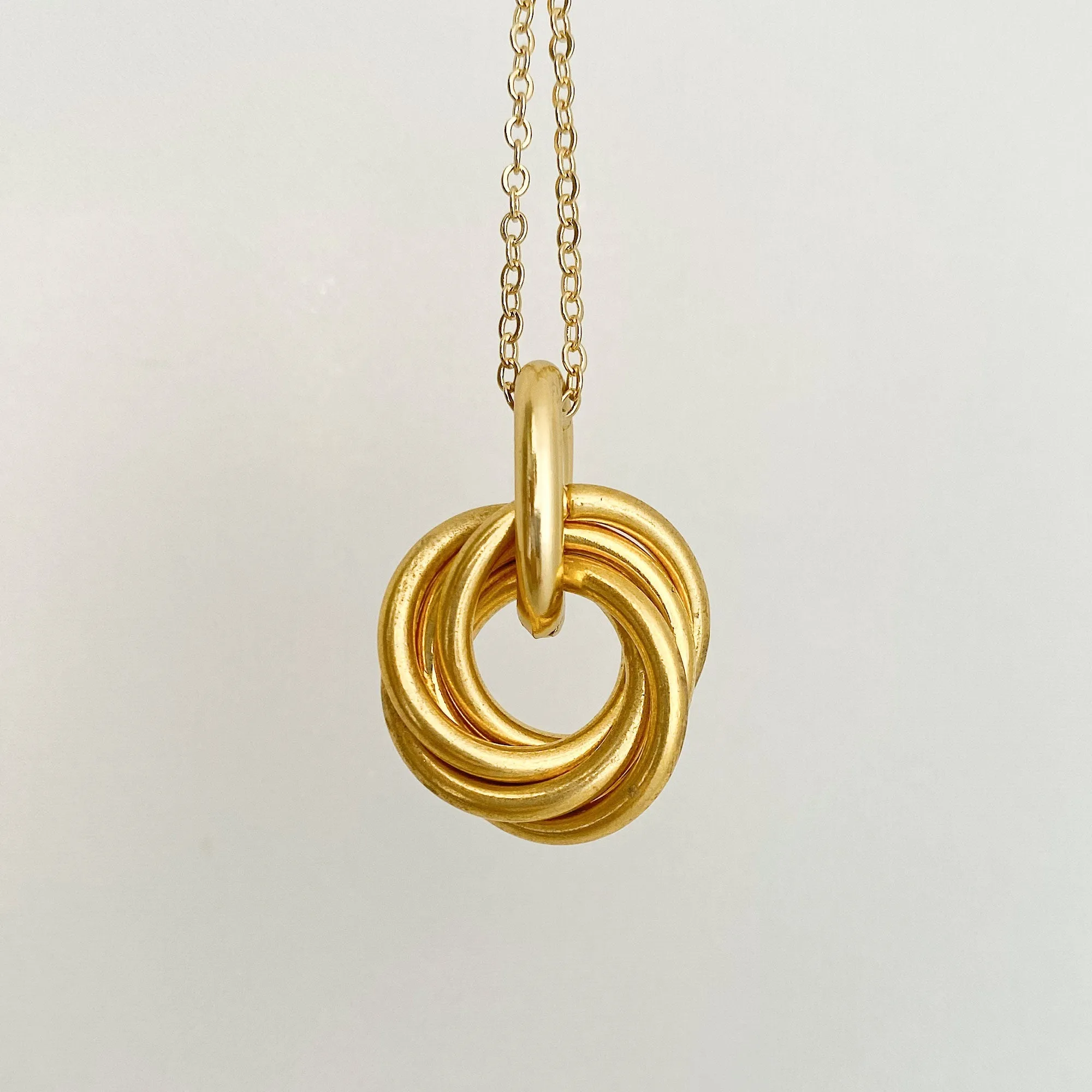 KAYLA gold love knot pendant necklace