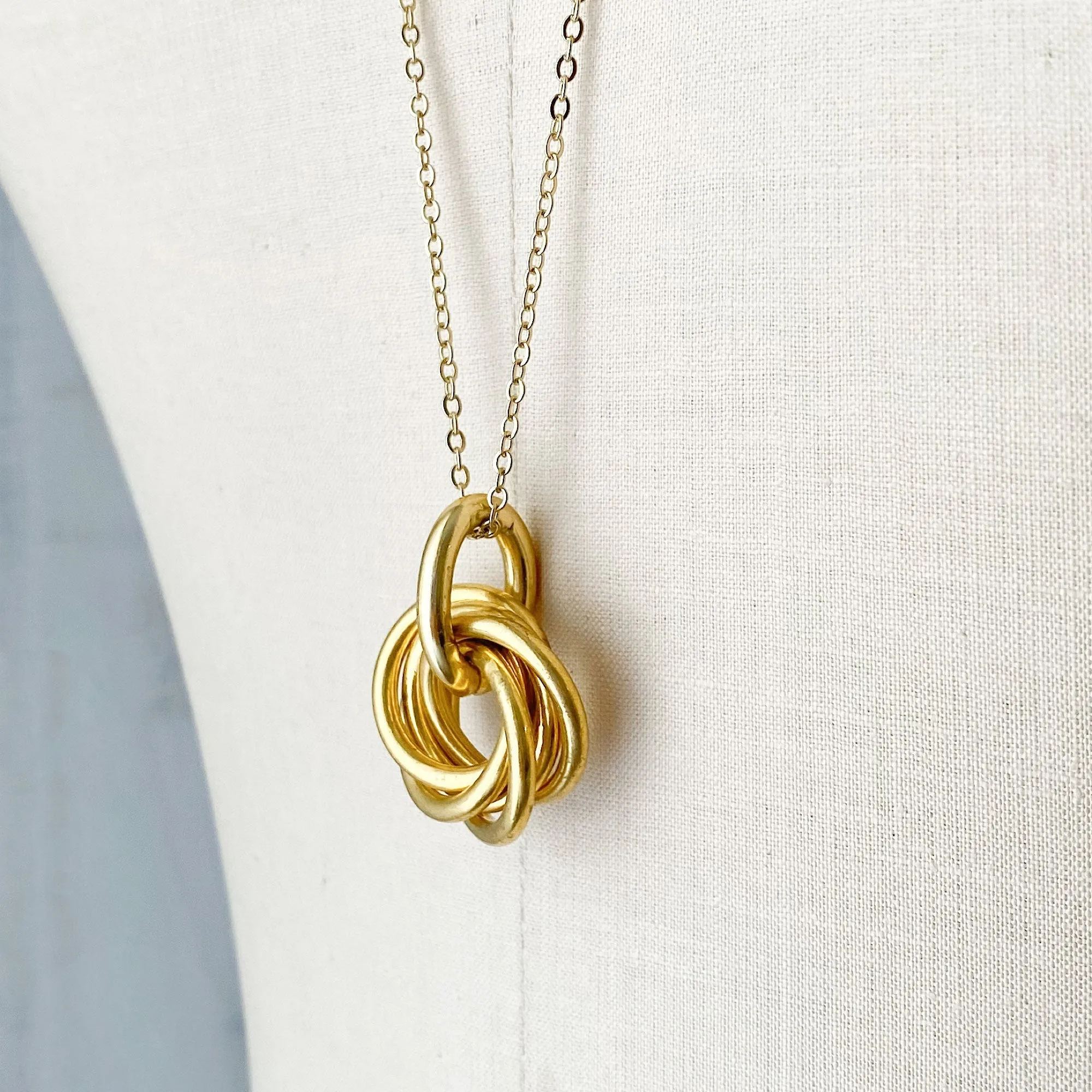 KAYLA gold love knot pendant necklace